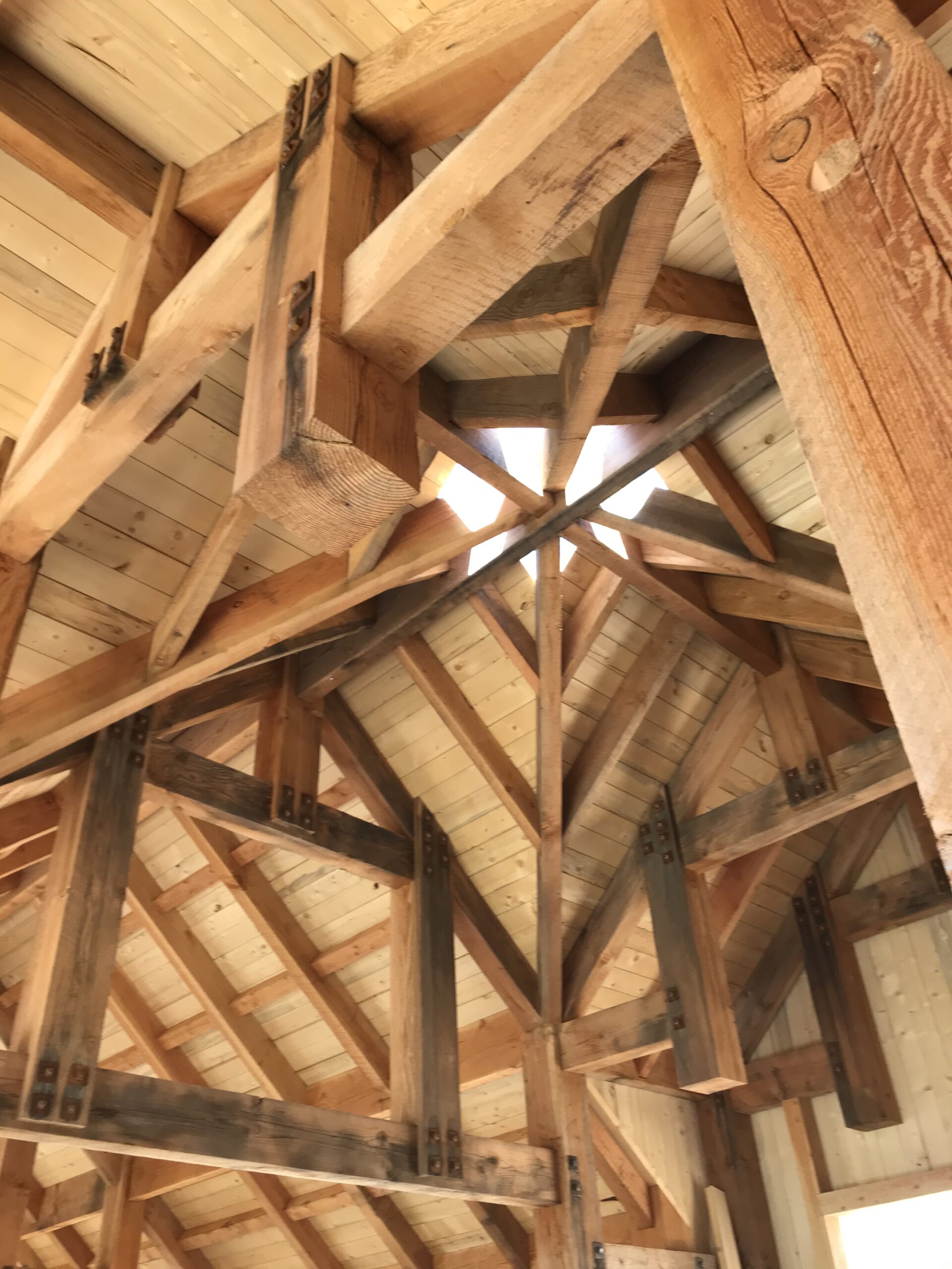 strong wooden trusses on conical roof